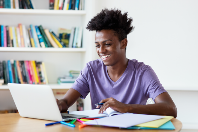Student taking notes